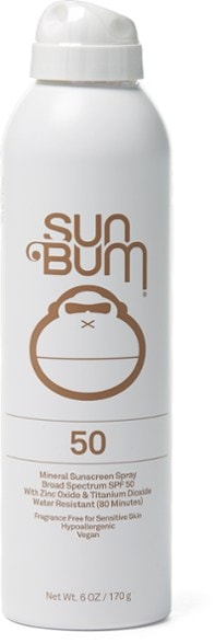 Mineral sunscreen spray for active use with zinc-based formula in a sporty outdoor setting