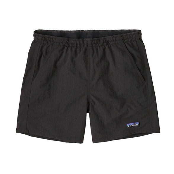 Patagonia women's Baggies 5 shorts displayed on a beach, showcasing their lightweight fabric and water-resistant features.