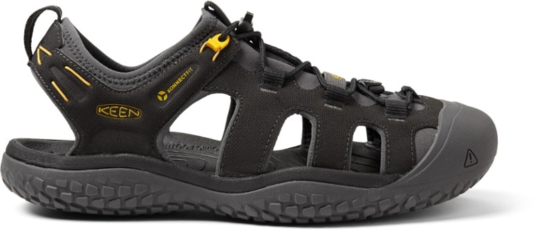 Side profile of men's water sandals, showing the durable recycled PET upper and the molded toe protection, ideal for watersports.