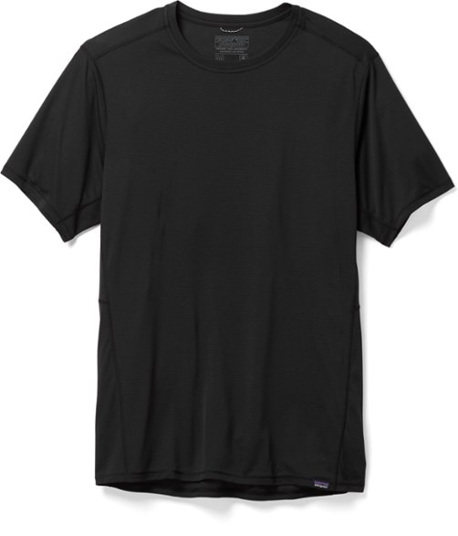 Patagonia Capilene Cool men's lightweight moisture-wicking shirt worn during outdoor hike