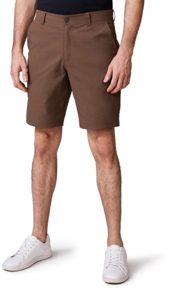 Front view of men's shorts showing mid-rise fit and slanted pockets — nylon shorts for versatile use.