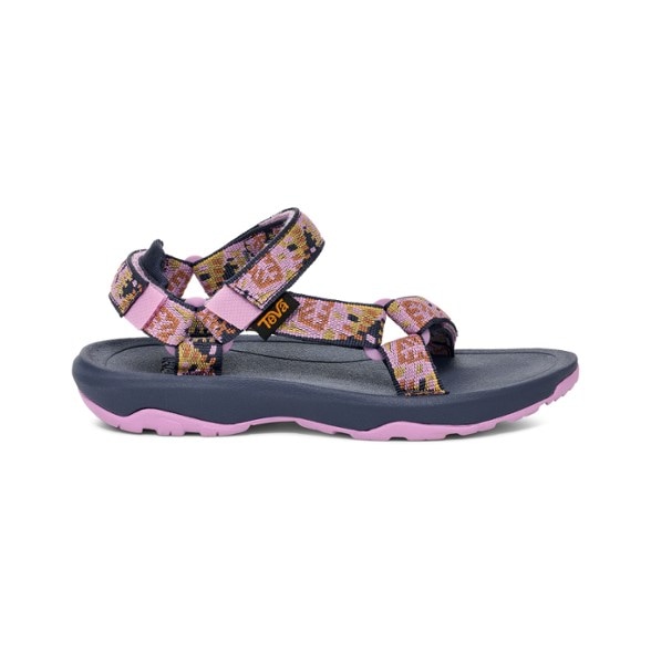 Close-up of Teva Kids Hurricane XLT2 sandals showcasing the quick strap closure and soft heel padding.