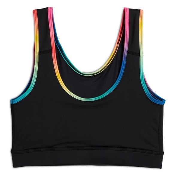 Active woman wearing the recycled fabric swim top during open-water swimming
