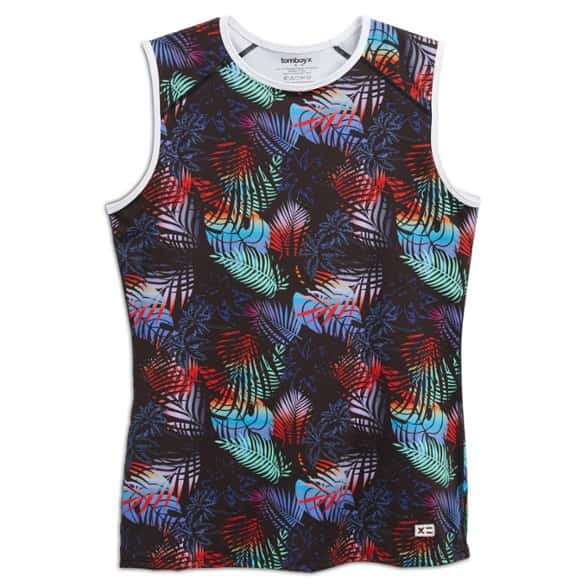 Eco-friendly women's swim tank top in action at the beach, showcasing moisture-wicking quality.