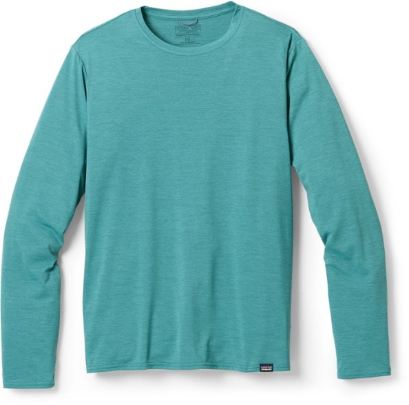 Patagonia men's long sleeve activewear shirt in motion during a run
